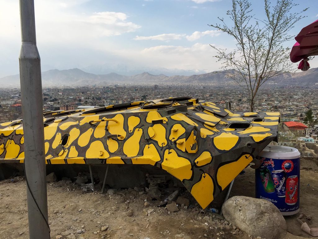 Soviet military vehicle painted with a yellow pear pattern in Kabul