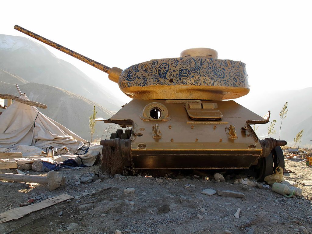 Soviet military tank with blue paisley-patterned turret in Panjshir
